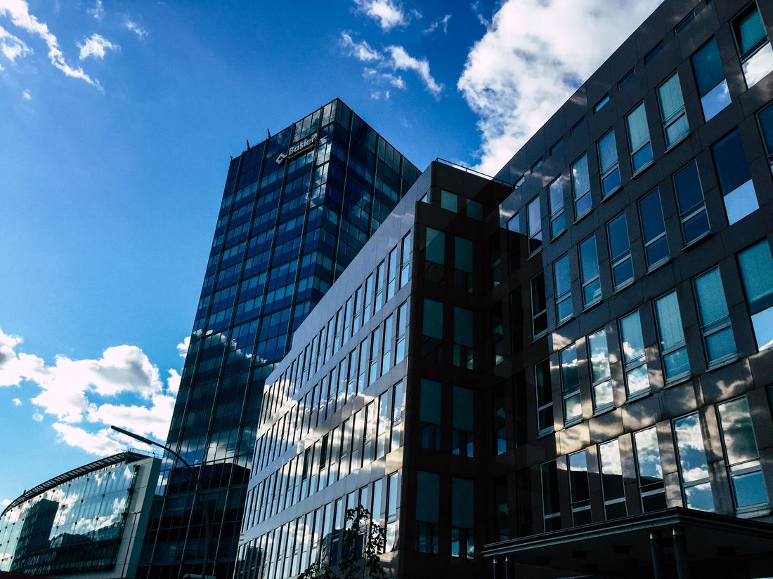 Modern commercial glass facade at dusk
